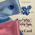 Blue princess-style adjustable bow hair band for dogs on a white background.