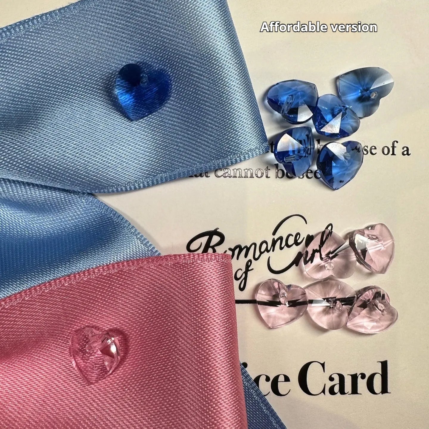 Blue princess-style adjustable bow hair band for dogs on a white background.