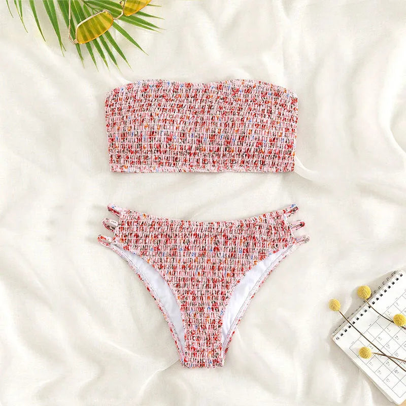 Women's strapless floral print swimsuit with high waist briefs and beauty back design.