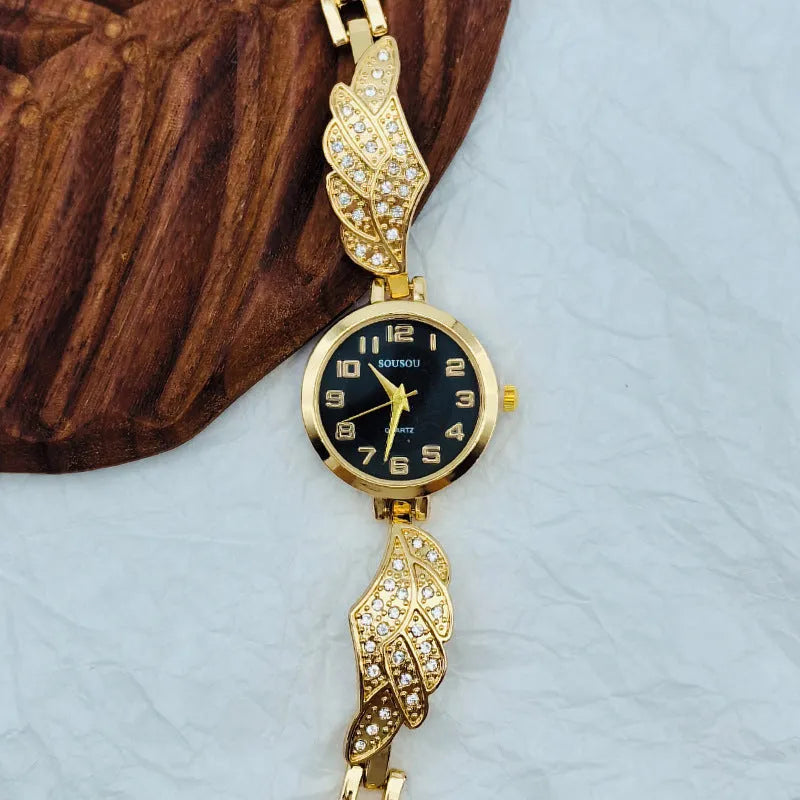 Stainless steel women's wristwatch with round dial on a metal bracelet with Vachette clasp.