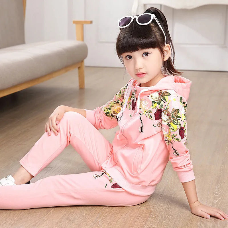 Children's pink hooded track suit set showing pullover top and joggers for age 8+