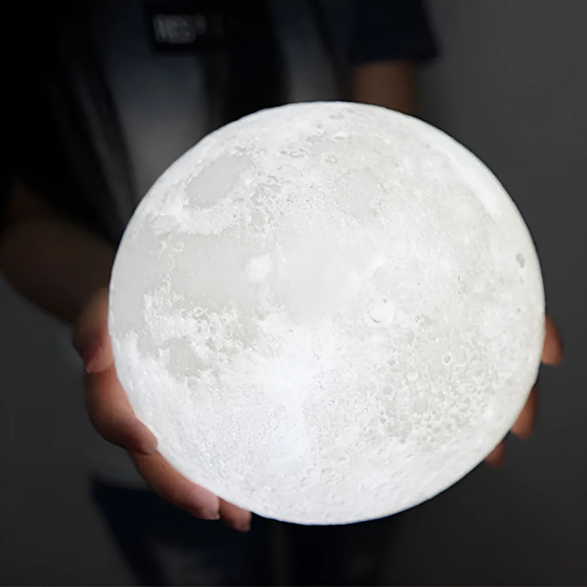 3D printed moon lamp on wooden stand showing lunar surface details with touch control ring
