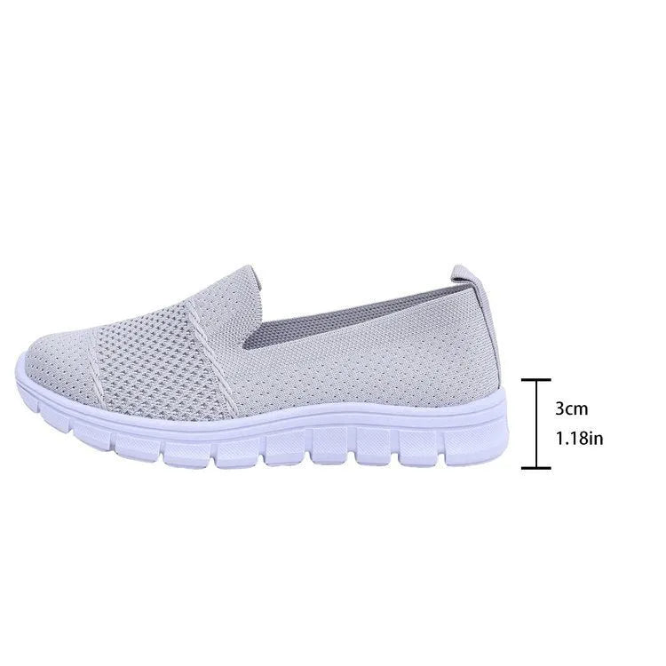 Women's mesh breathable flat casual shoes in black, round toe, PVC sole, side view