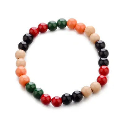 Natural lava stone bead bracelet with ethnic style design on wrist