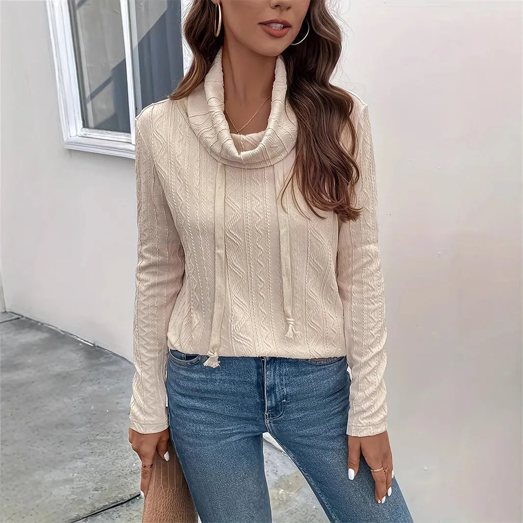 Apricot coloured hooded pullover sweater with long sleeves and drawstring waist