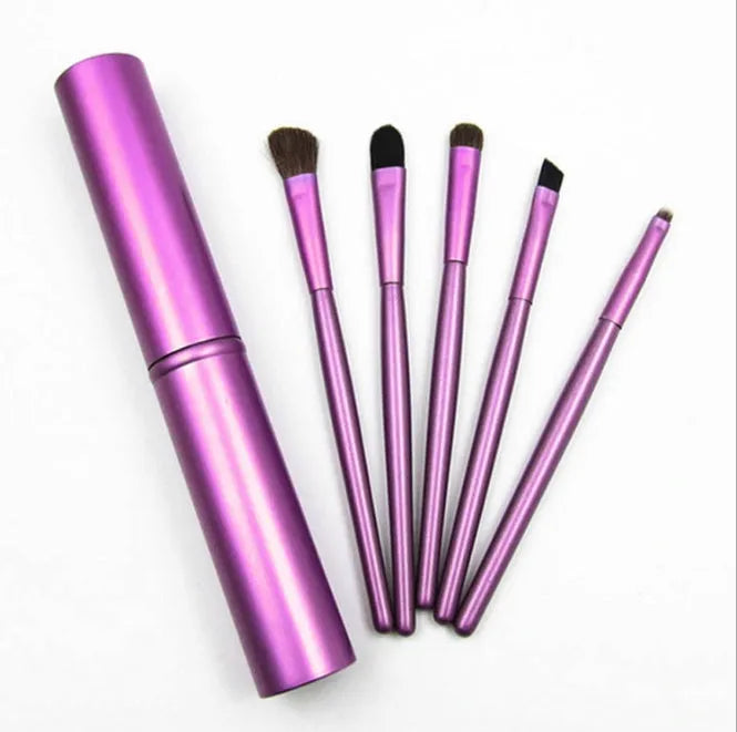 Makeup brush with soft synthetic fibre bristles, available in black, gold, green, pink and purple for professional, family or travel use