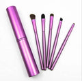Makeup brush with soft synthetic fibre bristles, available in black, gold, green, pink and purple for professional, family or travel use