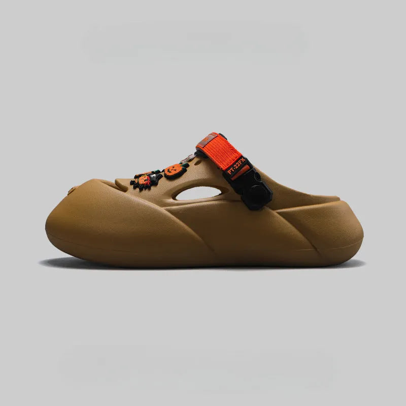 Men's grey baotou beach shoes with EVA sole and closed-toe design on a sandy background.