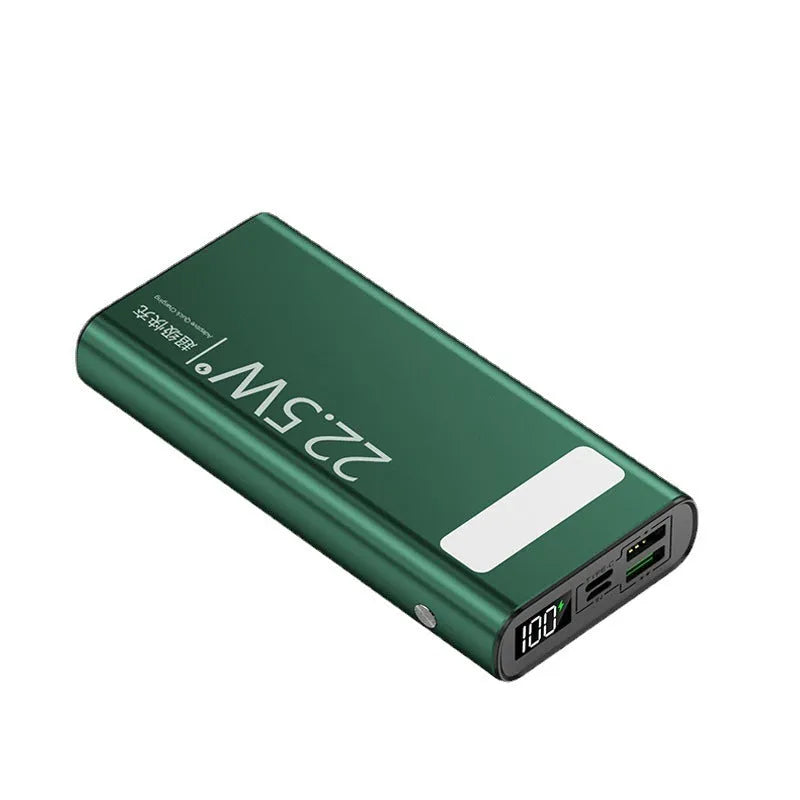 Black alloy power bank with LCD display showing battery level, featuring USB-A and USB-C ports.