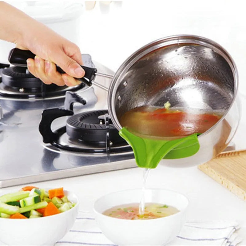 Green silicone kitchen funnel with curved design for round pots