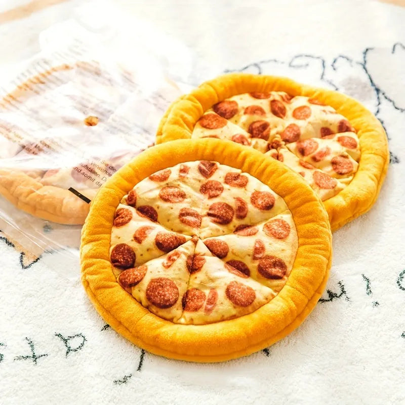Yellow rubber pizza-shaped dog chew toy with squeaker for interactive play.