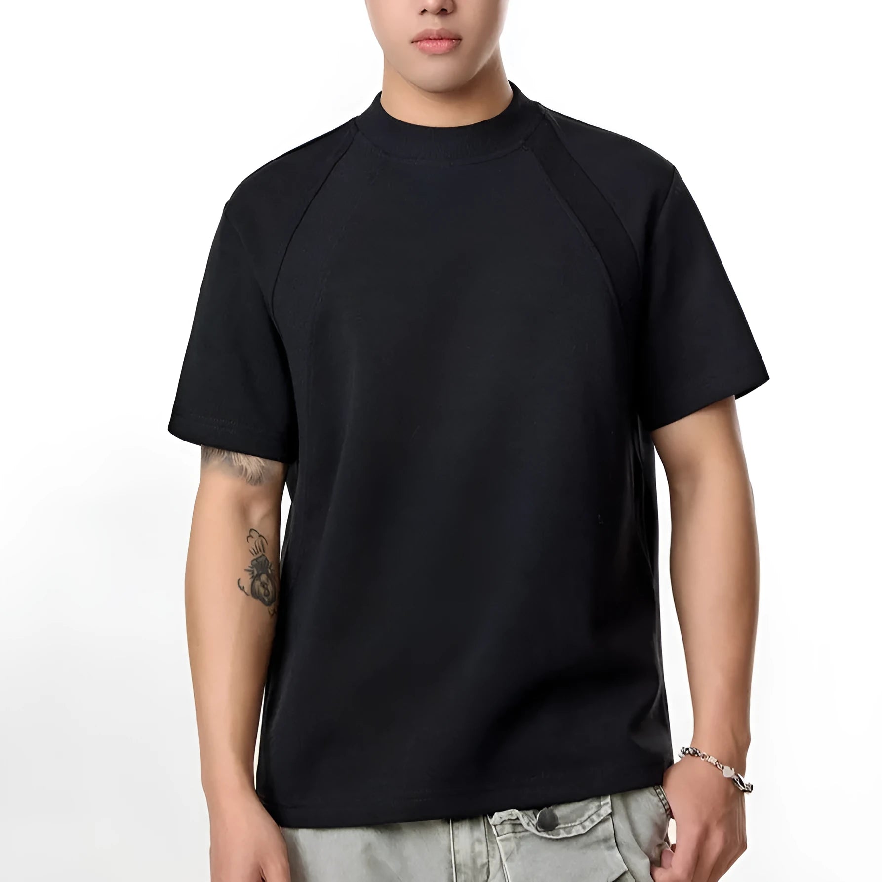 Loose fit short sleeve top with textured air layer stitching in black colour