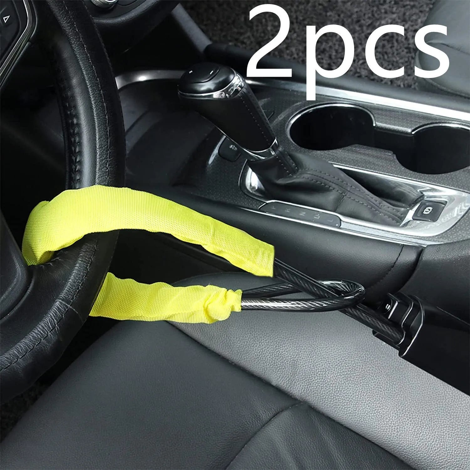 Red iron steering wheel lock with wire rope for a General Motors car.