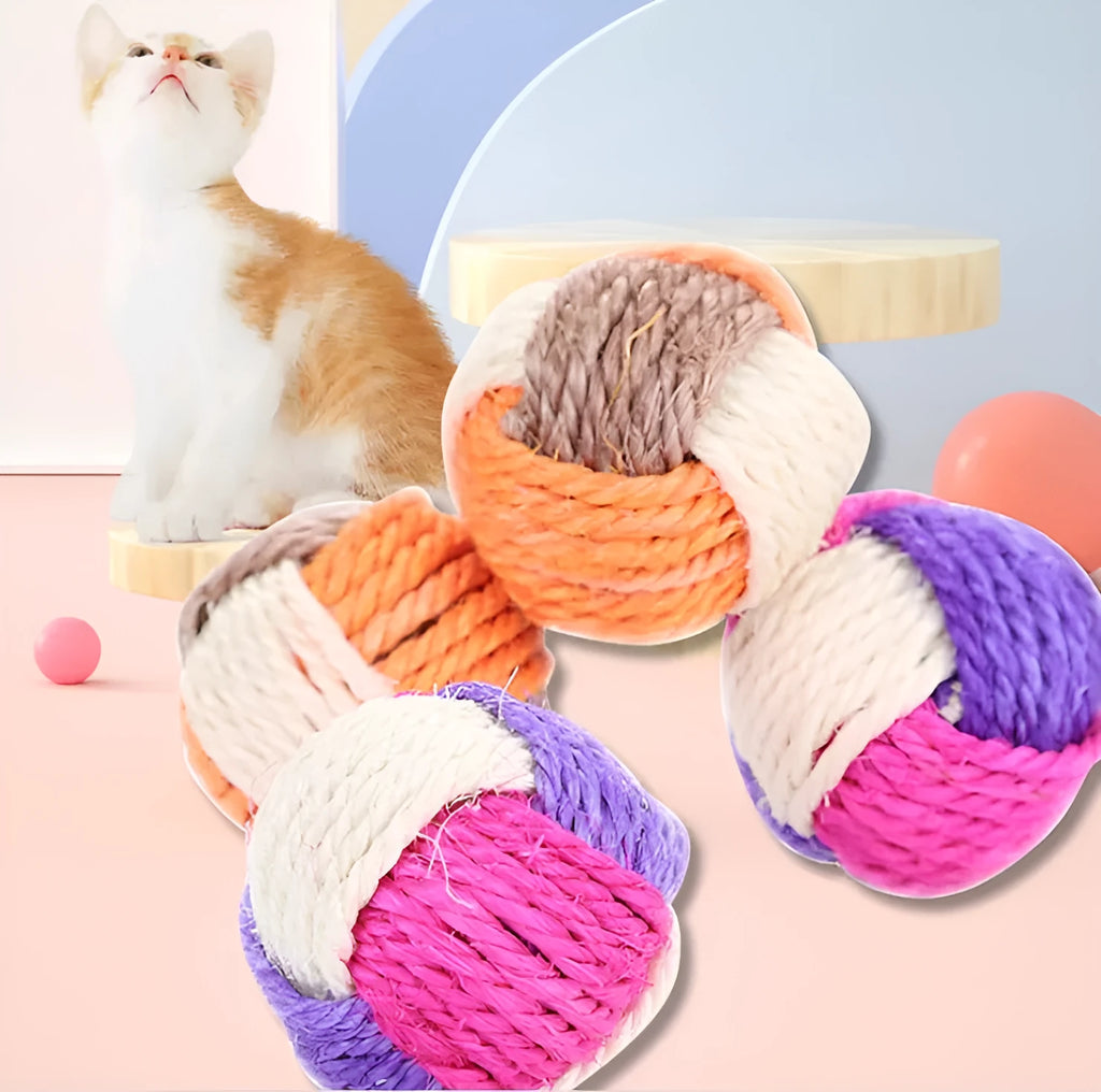 Natural sisal cat toy ball 6cm diameter for biting play on white background