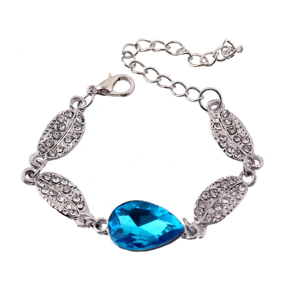 Three-piece bride headdress set with alloy bracelet, earrings, and pendant drop in European American cross-border design