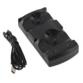 Black PS3 dual controller charging dock with two PS3 wireless controllers placed on charging contacts.