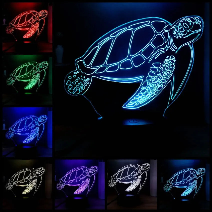 3D acrylic turtle-shaped LED night light glowing in blue, with a remote control.