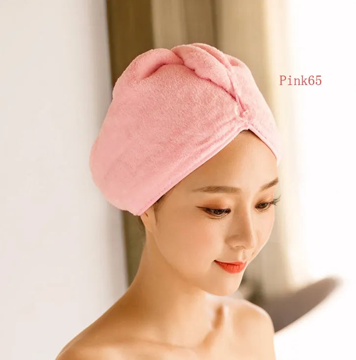 Microfiber hair drying cap in assorted colours measuring 60cm by 25cm