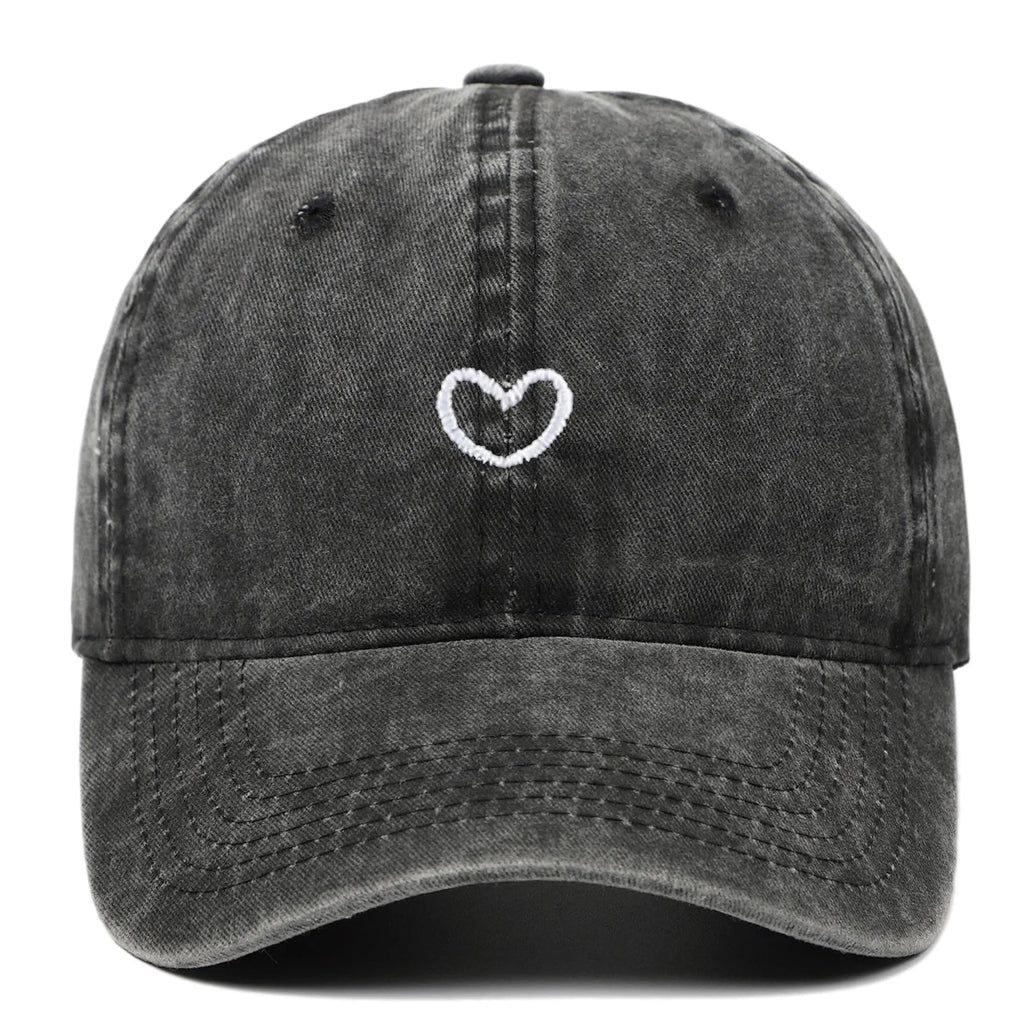 Soft cotton embroidered baseball cap with adjustable strap on a neutral background.