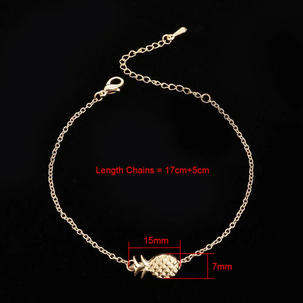 Gold tone and silver tone alloy pineapple bracelets for women on a white background.