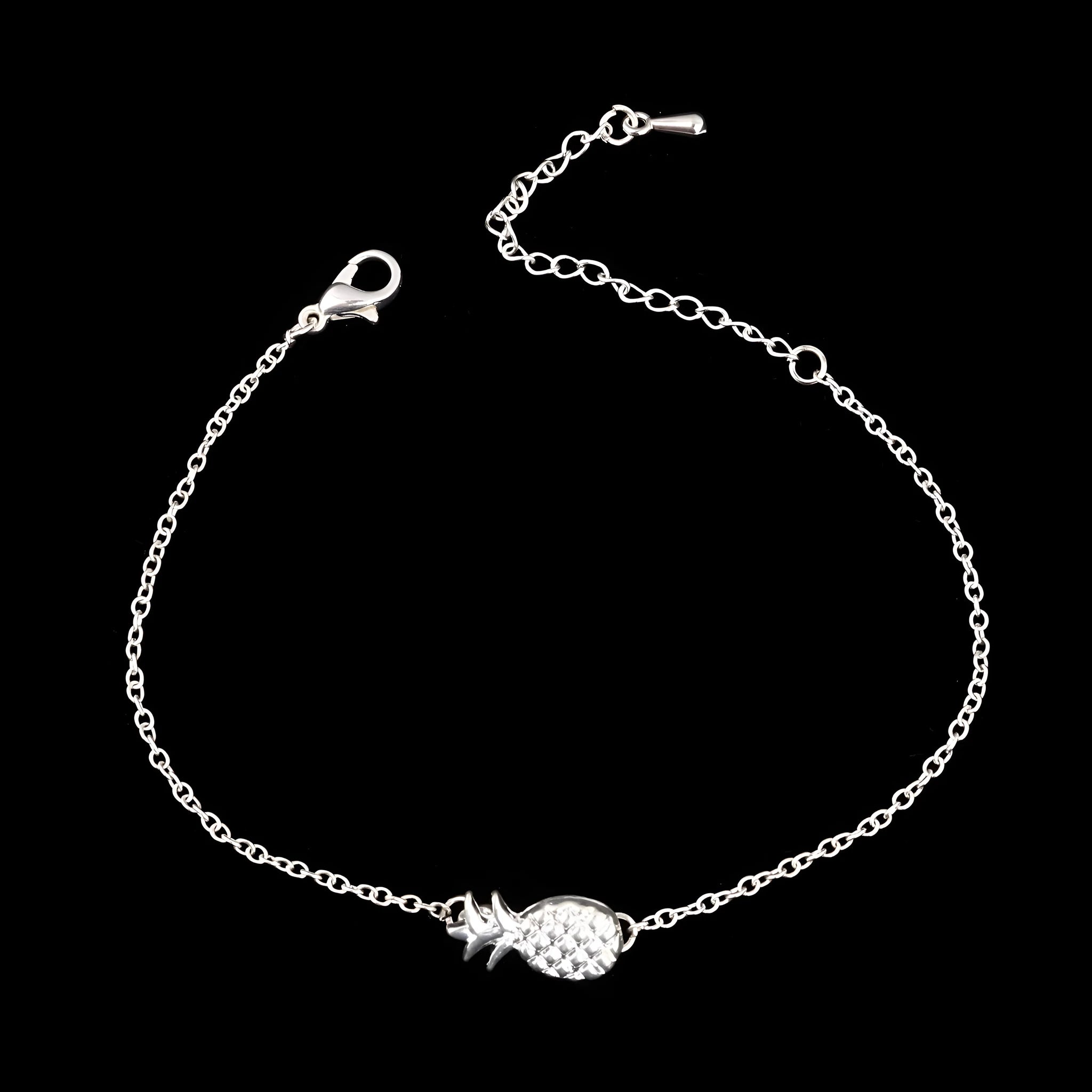 Gold tone and silver tone alloy pineapple bracelets for women on a white background.