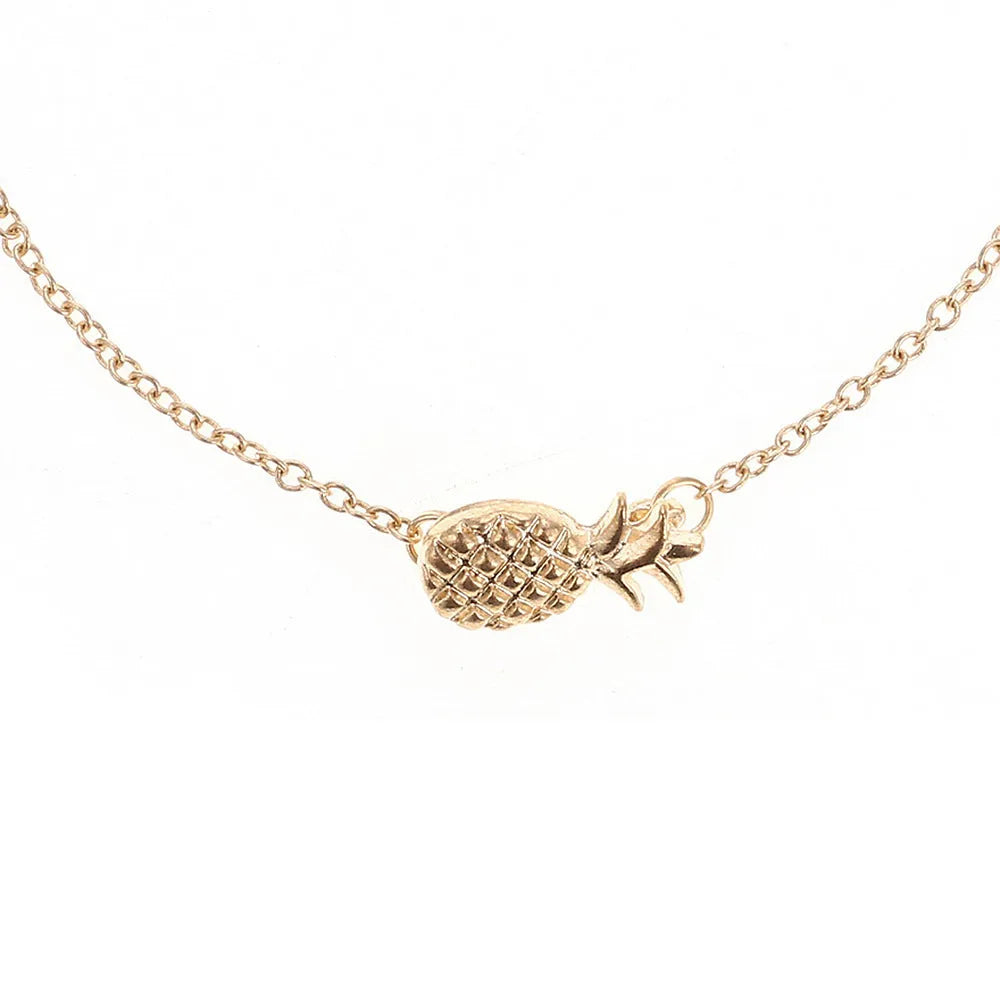 Gold tone and silver tone alloy pineapple bracelets for women on a white background.