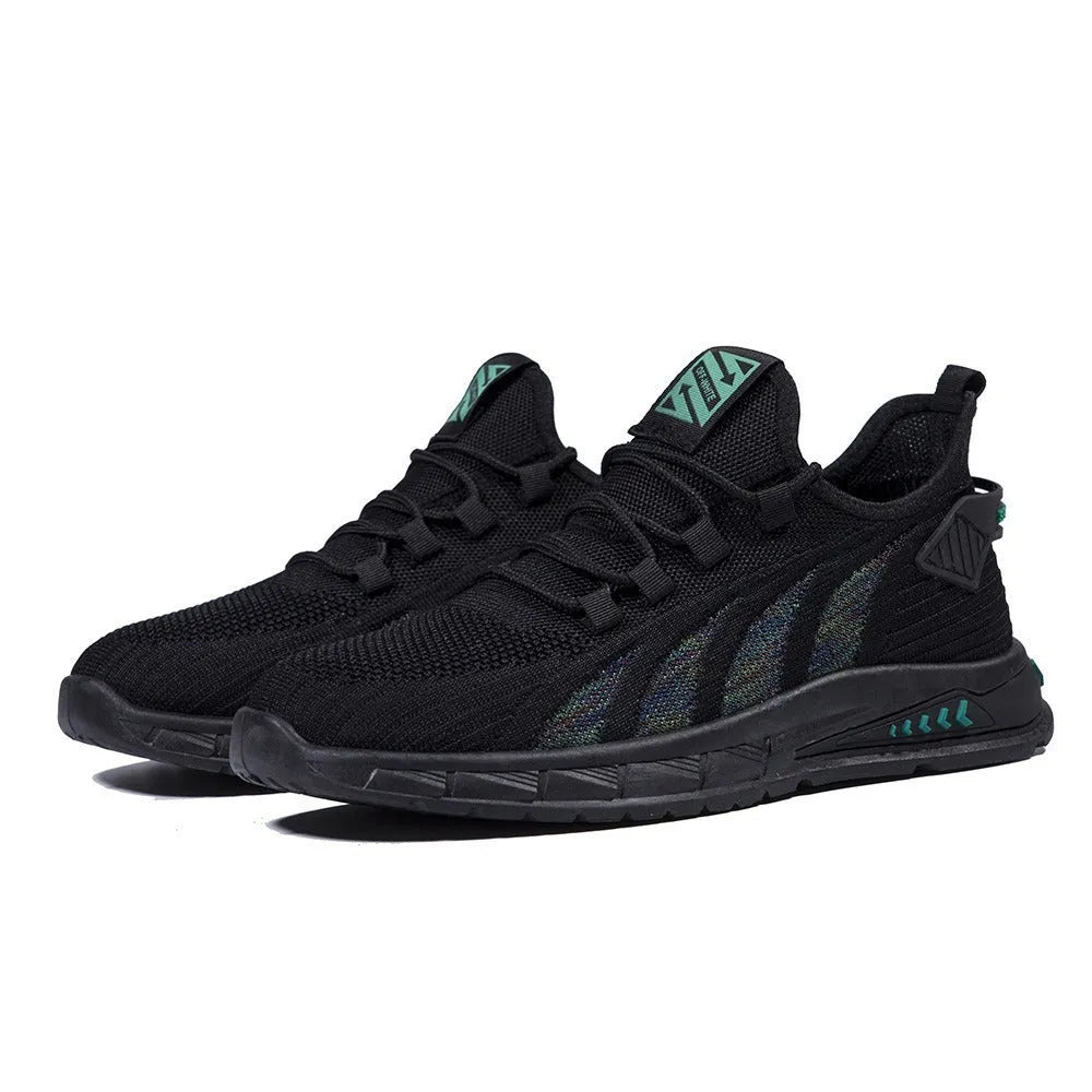 Low-top black mesh tennis sneakers with a plastic sole on a white background