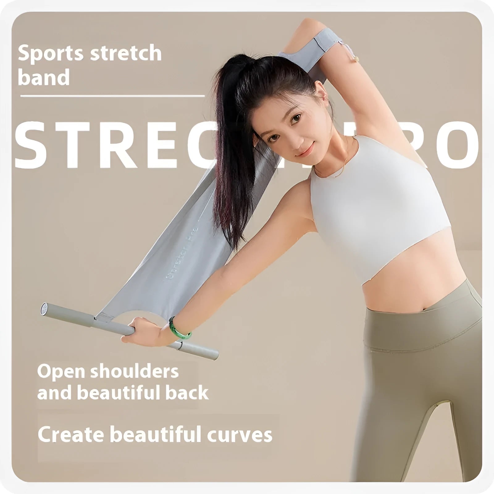 Grey and pink yoga stretching tool for shoulder, back, and hip flexibility training.