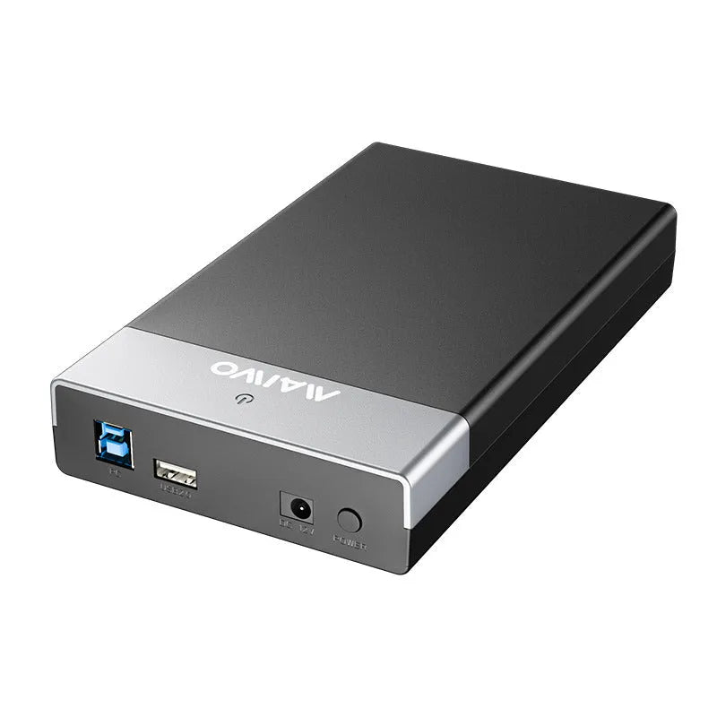 3.5-inch external hard drive enclosure in ABS plastic with USB 3.0 cable and power supply.