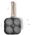 Four-hole non-stick frying pan with bakelite handle for making eggs and burgers