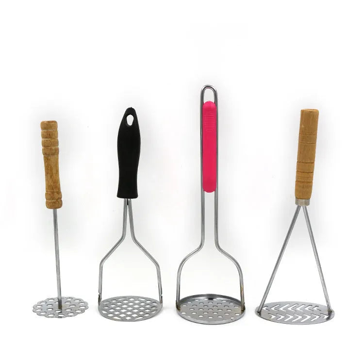 Manual potato masher with flower-shaped iron plated head and wooden handle on white background