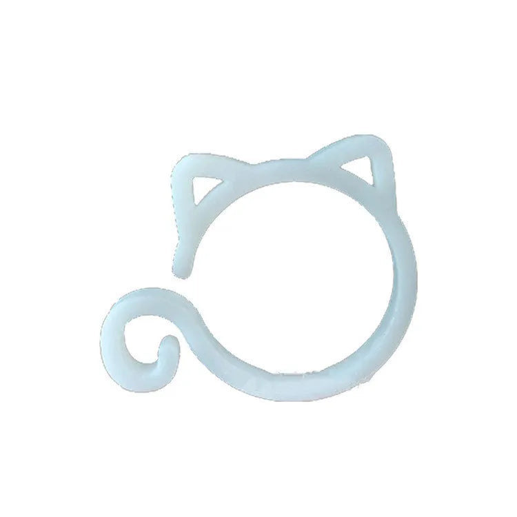 Small green plastic plant clip shaped like a cat, shown next to a plant stem.