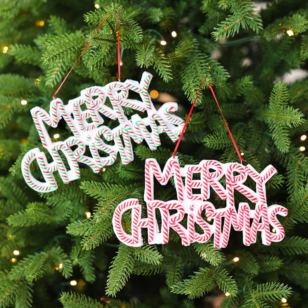 Merry Christmas letter plate polymer clay ornament in red and white hanging on Christmas tree branch