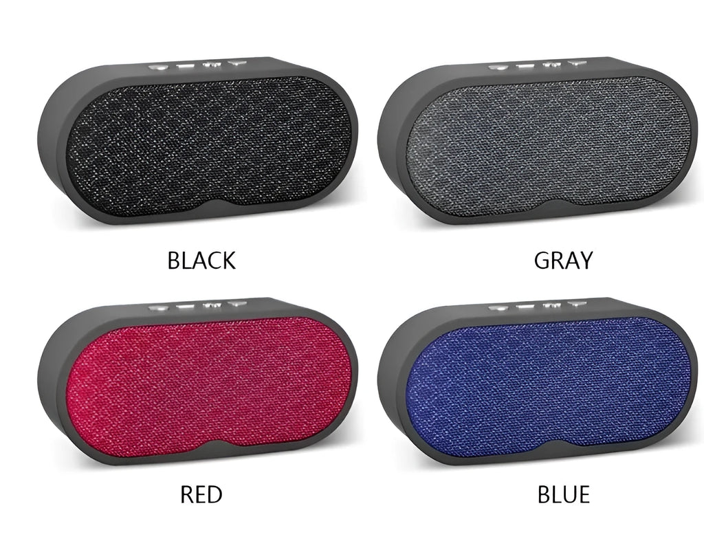 A grey Bluetooth wireless subwoofer speaker unit with a front-facing grille, sitting on a surface.