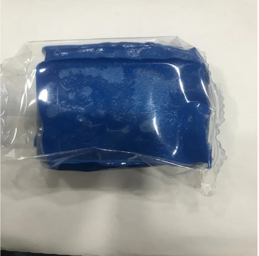 Dark blue Magic Clay car washing mud block with universal fit for paint decontamination