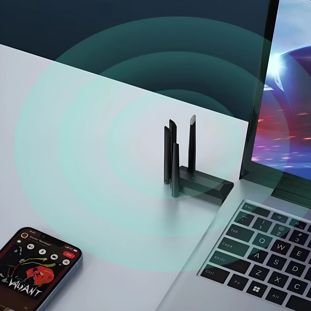 Black USB Wi-Fi network transmitter dongle with four external antennas.