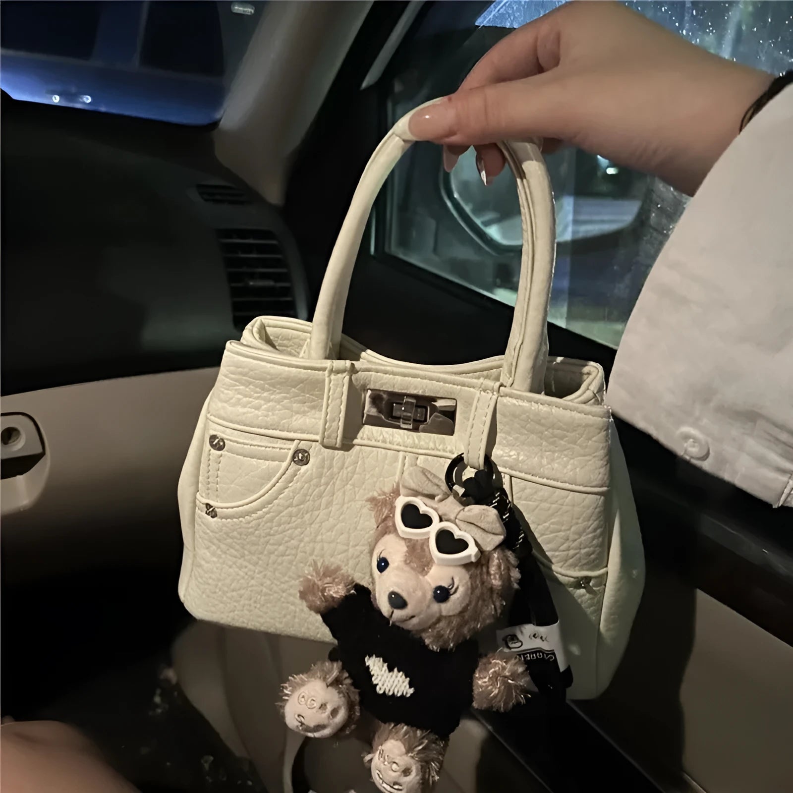 Women's soft PU shoulder bag in denim blue and white colour options without pendants