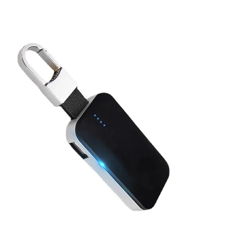 Black Apple Watch wireless power bank with keychain attachment showing compact rectangular design