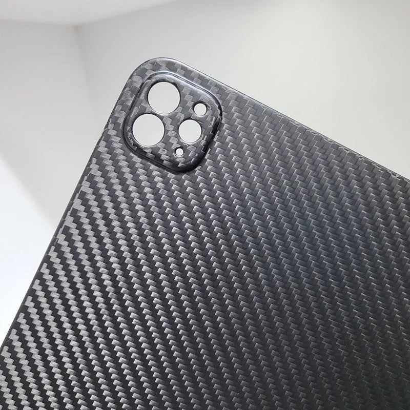 Flat carbon fibre hard protective case for Apple iPad Pro 11 tablet in a textured finish.