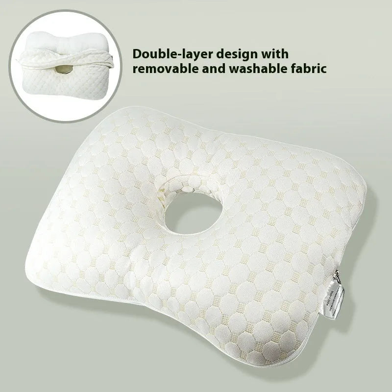 Beauty salon single hole ear pillow in Boer Grey colour on a treatment bed.