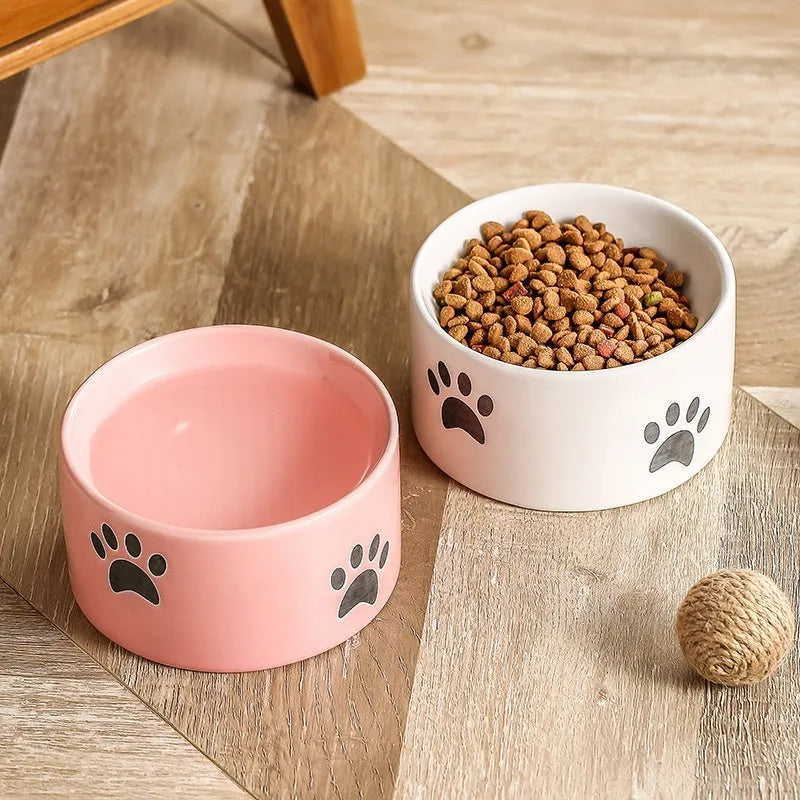 Ceramic cat bowl with high-foot design and cat's paw pattern in choice of colours