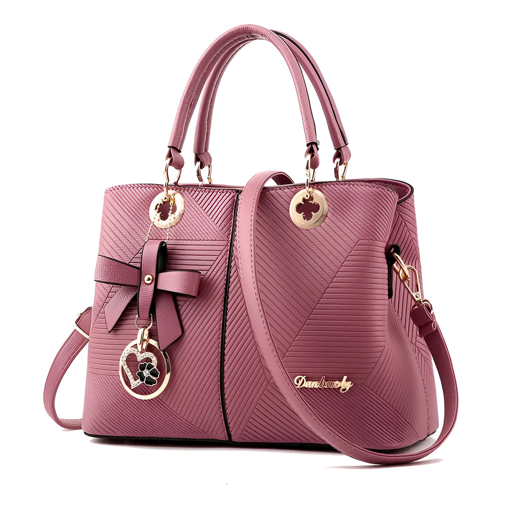 Retro style PU leather handbag with zipper opening and shoulder strap in multiple colours.