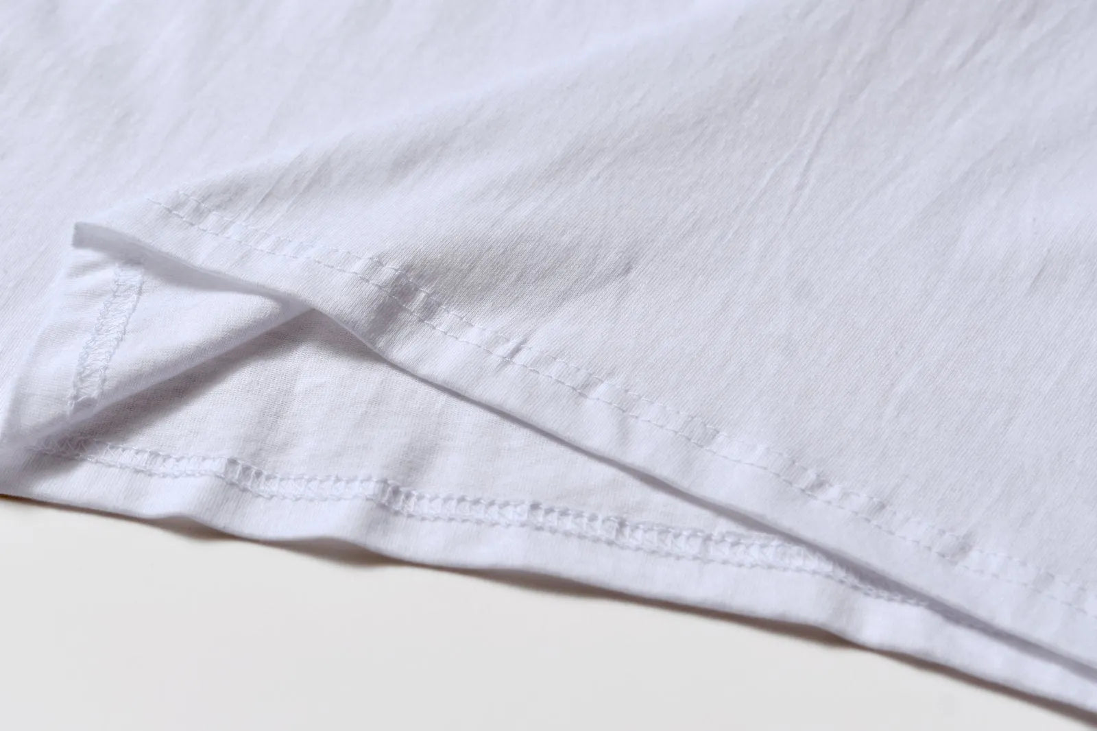White cotton pattern overalls with short sleeves and loose pullover style