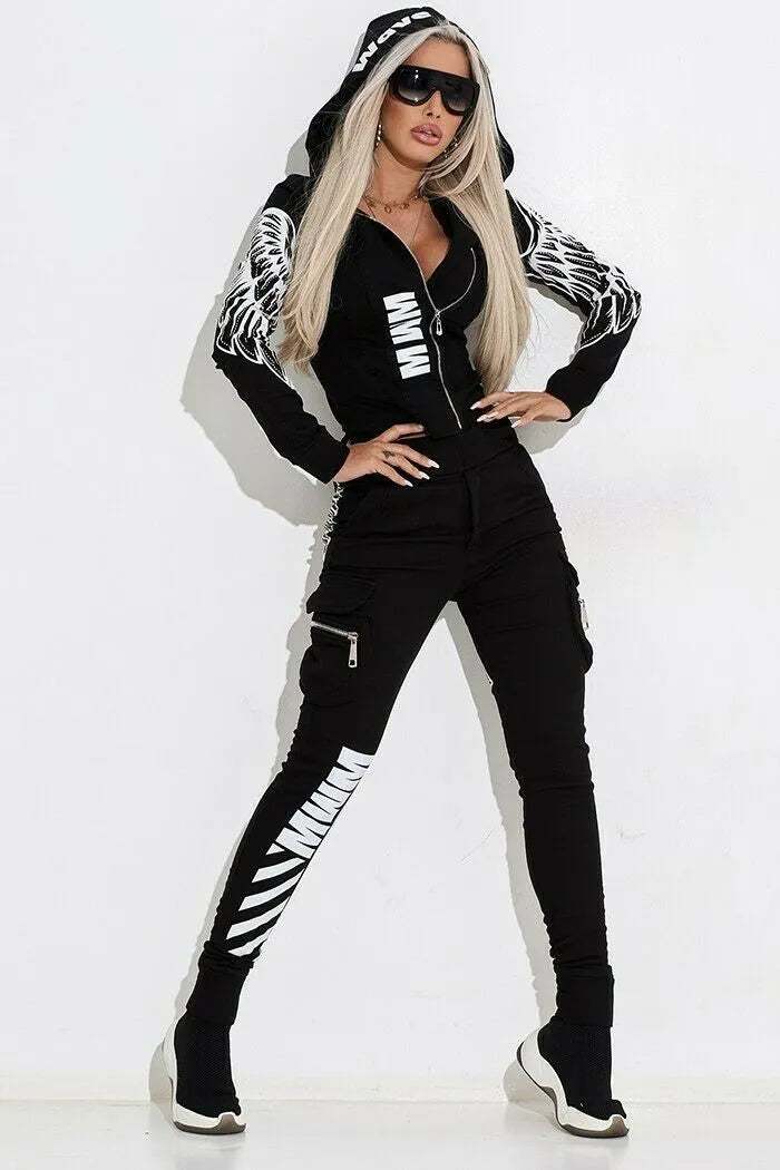 Black women's hoodie and trouser set with wings printing on the fabric.