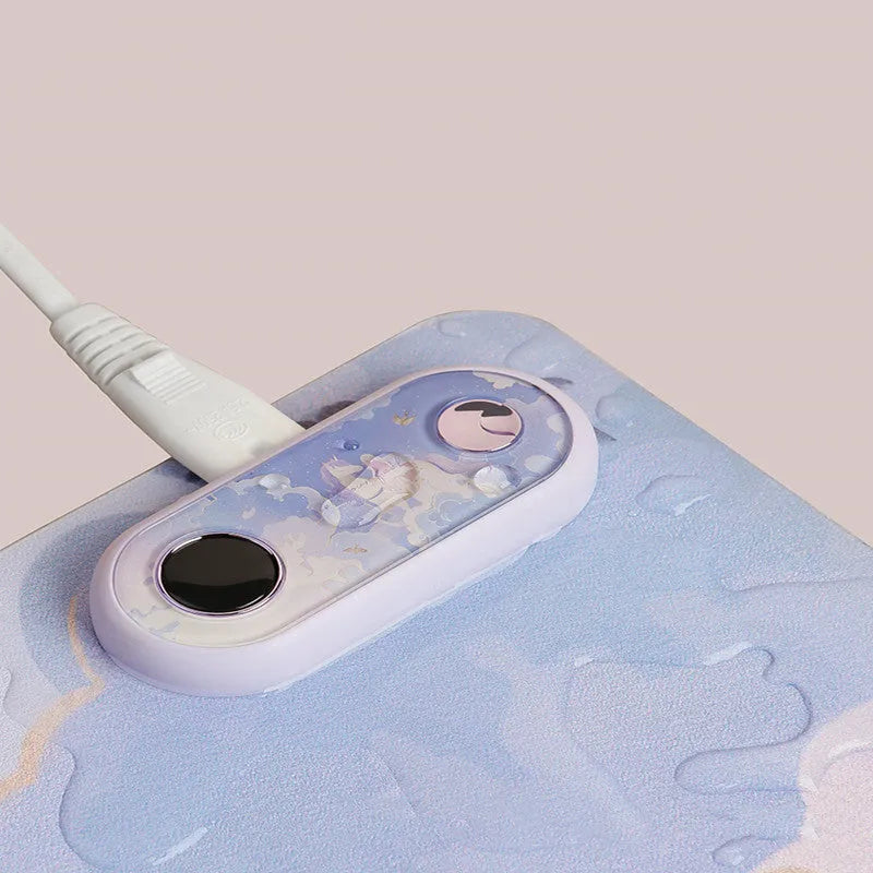 Electric desktop heating pad with PVC leather surface showing artistic pattern options
