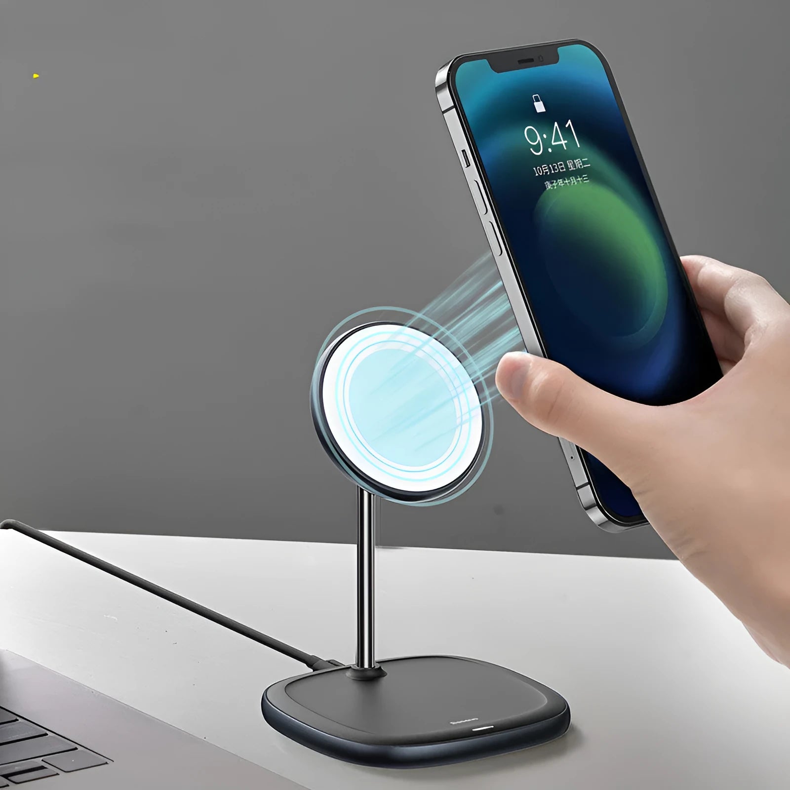 Black magnetic wireless charging stand for iPhone 12 series on desk with Type-C cable