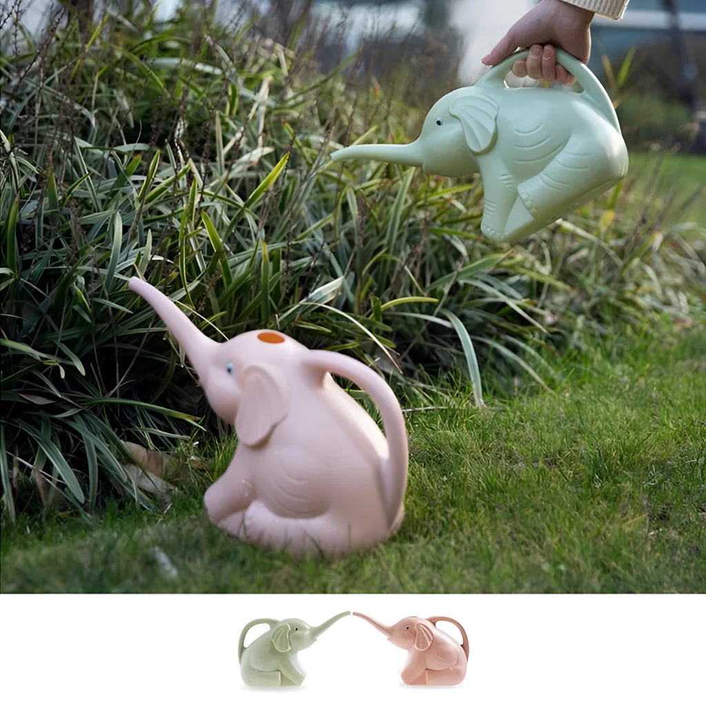 Pink plastic elephant-shaped watering can with a long nozzle and a child-sized handle.