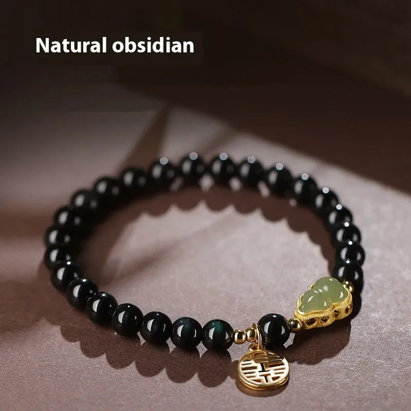Black obsidian bracelet with Hetian jade gourd charm in 6mm, 8mm, or 10mm bead sizes
