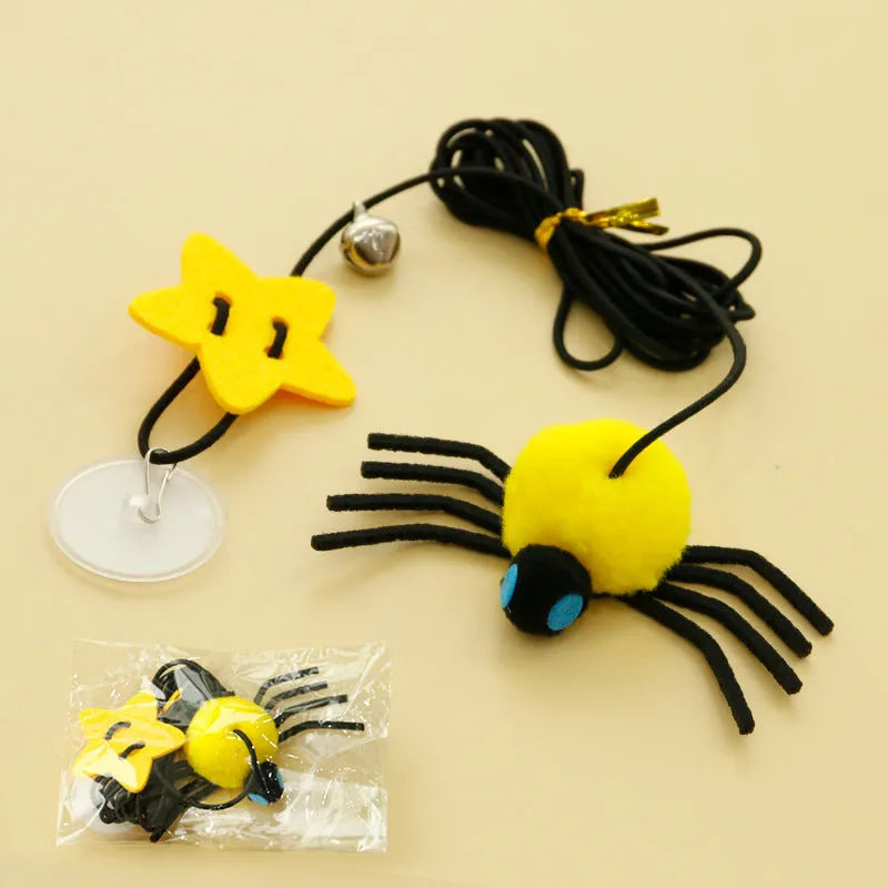 Hanging door cat toy with elastic rope, feather and bell spider accessory in red colour