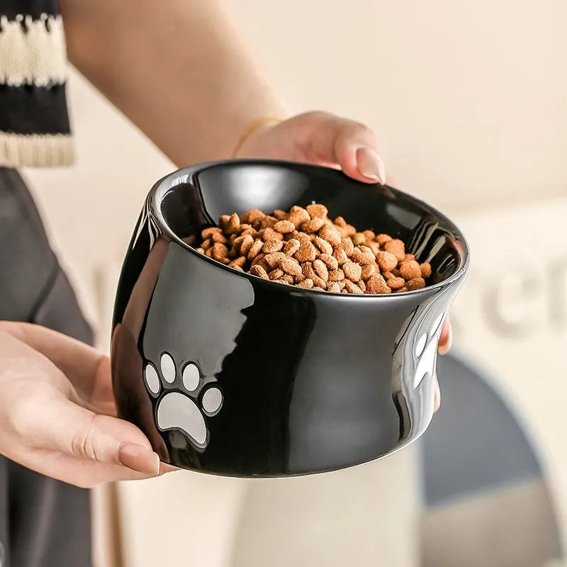 Ceramic cat bowl with high-foot design and cat's paw pattern in choice of colours